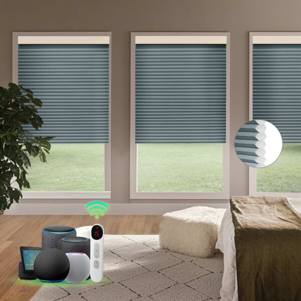 Motorized light-filtering cellular shades in bedroom with bed, ottoman, and smart home voice control devices, overlooking green backyard